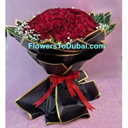 101 red roses with black paper