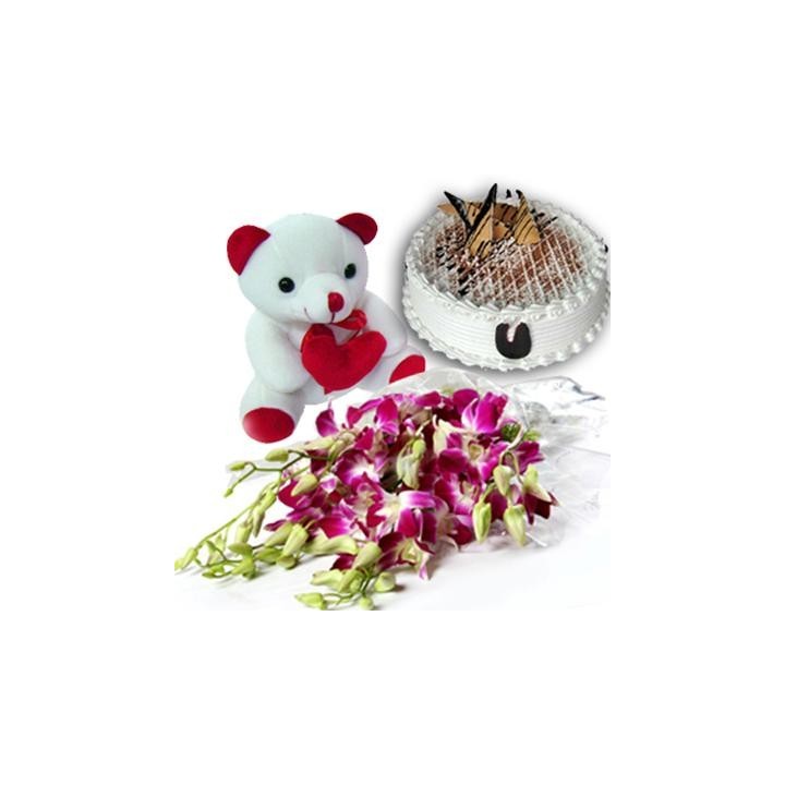Bunch of 6 Stem Purple/Blue Orchids along with 500gm Black Forest Cake and 6 inches Cute Teddy Bear