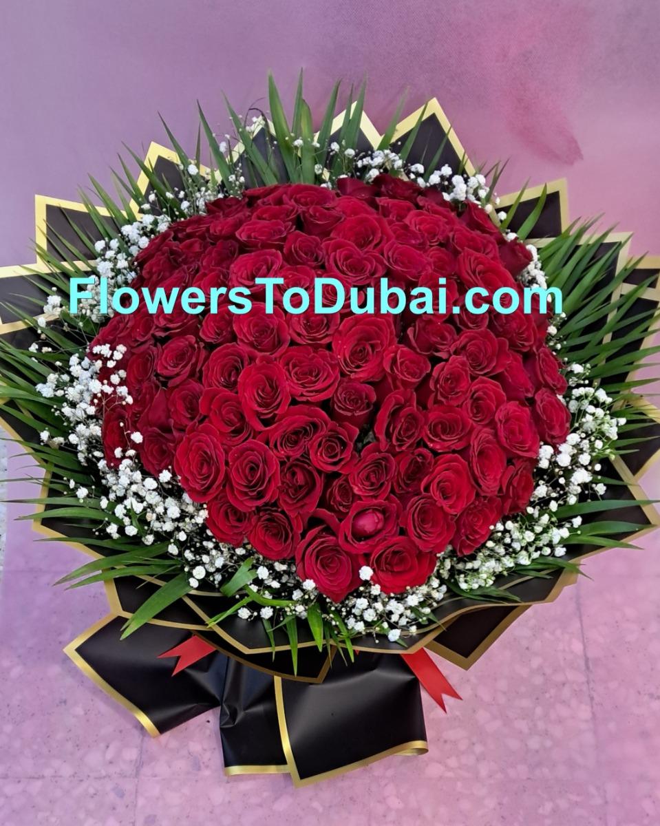 101 red roses with black paper