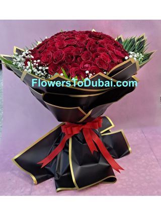 101 red roses with black paper  - Fresh Flowers Dubai
