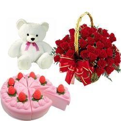 50 rose rosse cesto accordo con 500 grammi di fragole torta e simpatico orsacchiotto