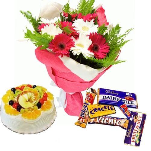 Paquet de 15 fleurs de couleurs mélangées avec un gâteau aux fruits frais de 1 kg et des chocolats Cadbury assortis